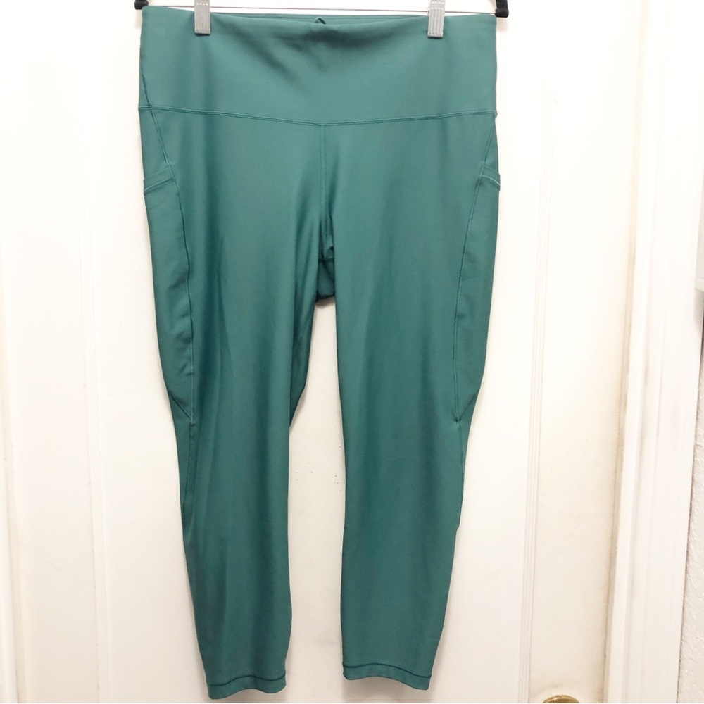 Athleta Interval Stash 7/8 Tight Leggings Size XL Color Green